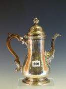 A GEORGE II SILVER COFFEE POT BY ?B, LONDON 1756, THE BALUSTER BODY ENGRAVED WITH A CREST ON ONE