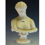 A MID VICTORIAN PARIAN BUST OF THE CLYTIE ON A SOCLE FOOT. H 29cms.