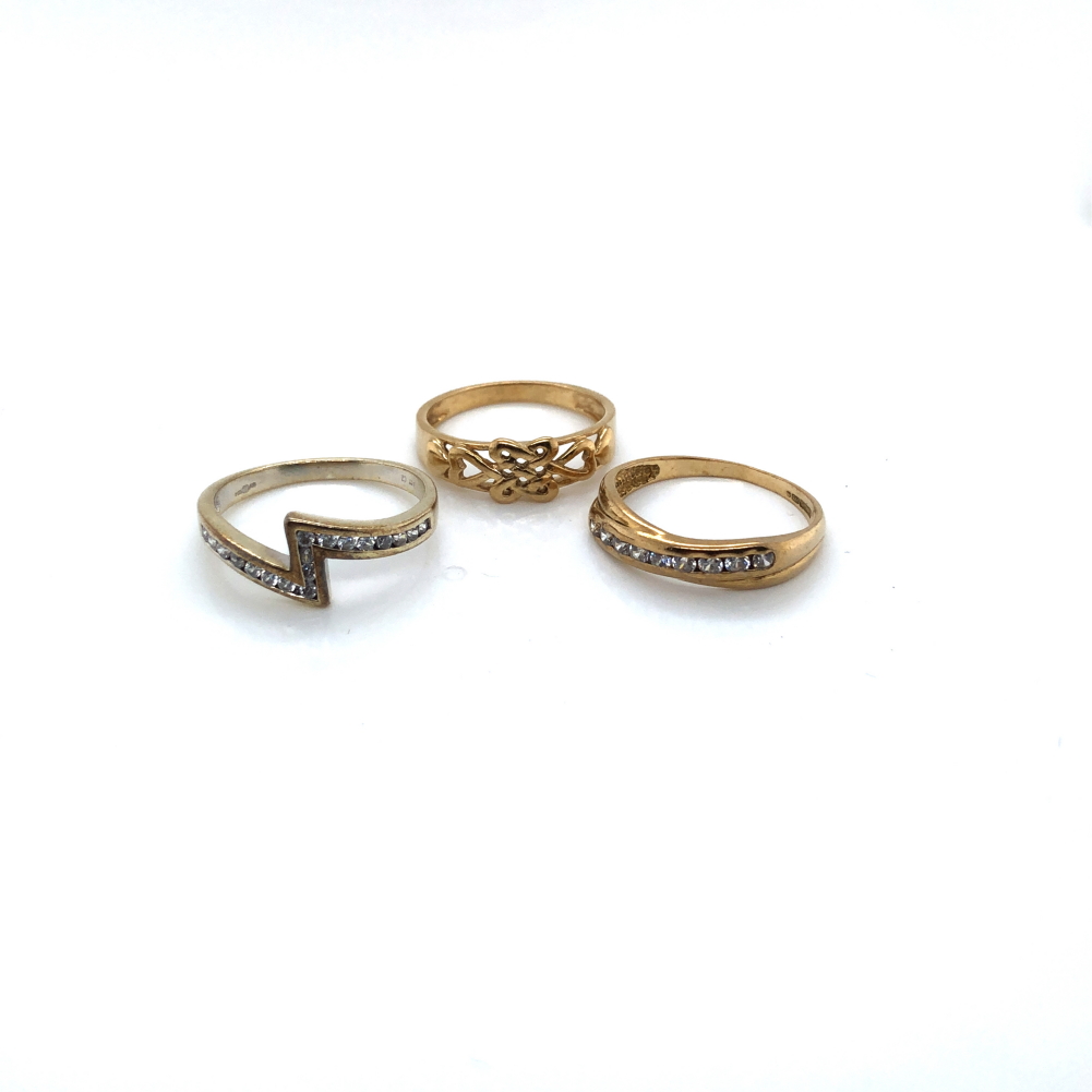 THREE 9ct HALLMARKED GOLD RINGS. TWO ETERNITY STYLE RINGS SET WITH CZ STONES AND THE OTHER A CELTIC - Image 2 of 2