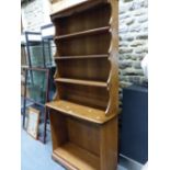 AN ERCOL ELM DRESSER WITH ENCLOSED THREE SHELF BACK, THE BASE WITH ADJUSTABLE SHELVING. W 90 x D