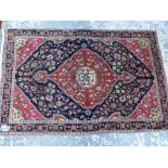 A PERSIAN SAROUK RUG. 160 x 103cms