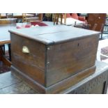 AN ANTIQUE OAK SMALL BLANKET BOX.