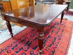 A VICTORIAN AND LATER MAHOGANY DINING TABLE WITH TWO LEAVES, THE RECTANGULAR ENDS ROUNDED ABOVE APR