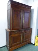 A 19th C. FRENCH OAK LINEN PRESS, THE UPPER HALF WITH TWO DOORS WITH LARGE BRASS FINGER PLATES,