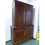 A 19th C. FRENCH OAK LINEN PRESS, THE UPPER HALF WITH TWO DOORS WITH LARGE BRASS FINGER PLATES,