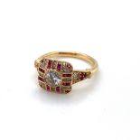 AN 18ct HALLMARKED GOLD DIAMOND AND FANCY CUT RUBY ART DECO STYLE RING. THE CENTRAL DIAMOND DIAMETER