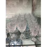 A TUDOR CUT GLASS PART DRINKING SERVICE, COMPRISING: TEN WHITE WINES, NINE RED WINES, NINE SHERRY