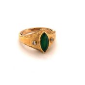 AN EMERALD AND DIAMOND RING. THE MARQUISE CUR EMERALD MEASURING APPROX 10.5mm X 4.5 IN A RUBOVER