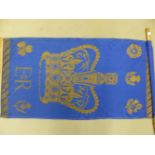 A BLUE TEXTILE BANNER GILT WITH A CROWN ABOVE EIIR, POSSIBLY FOR THE QUEENS CORONATION
