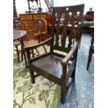 AN ANTIQUE OAK "LAMBING" TYPE ARM CHAIR TOGETHER WITH ANOTHER SIMILAR OF LATER DATE