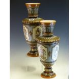 A PAIR OF METTLACH BALUSTER VASES INCISED WITH VIGNETTES OF PUTTI AMONGST FLOWERS ILLUSTRATING THE