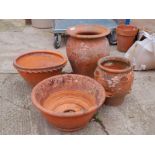 FOUR TERRACOTTA PLANTERS