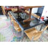 A RETRO CHROME AND GLASS EXTENDING DINING TABLE