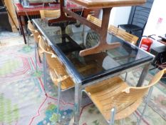 A RETRO CHROME AND GLASS EXTENDING DINING TABLE