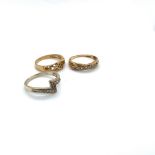 THREE 9ct HALLMARKED GOLD RINGS. TWO ETERNITY STYLE RINGS SET WITH CZ STONES AND THE OTHER A CELTIC