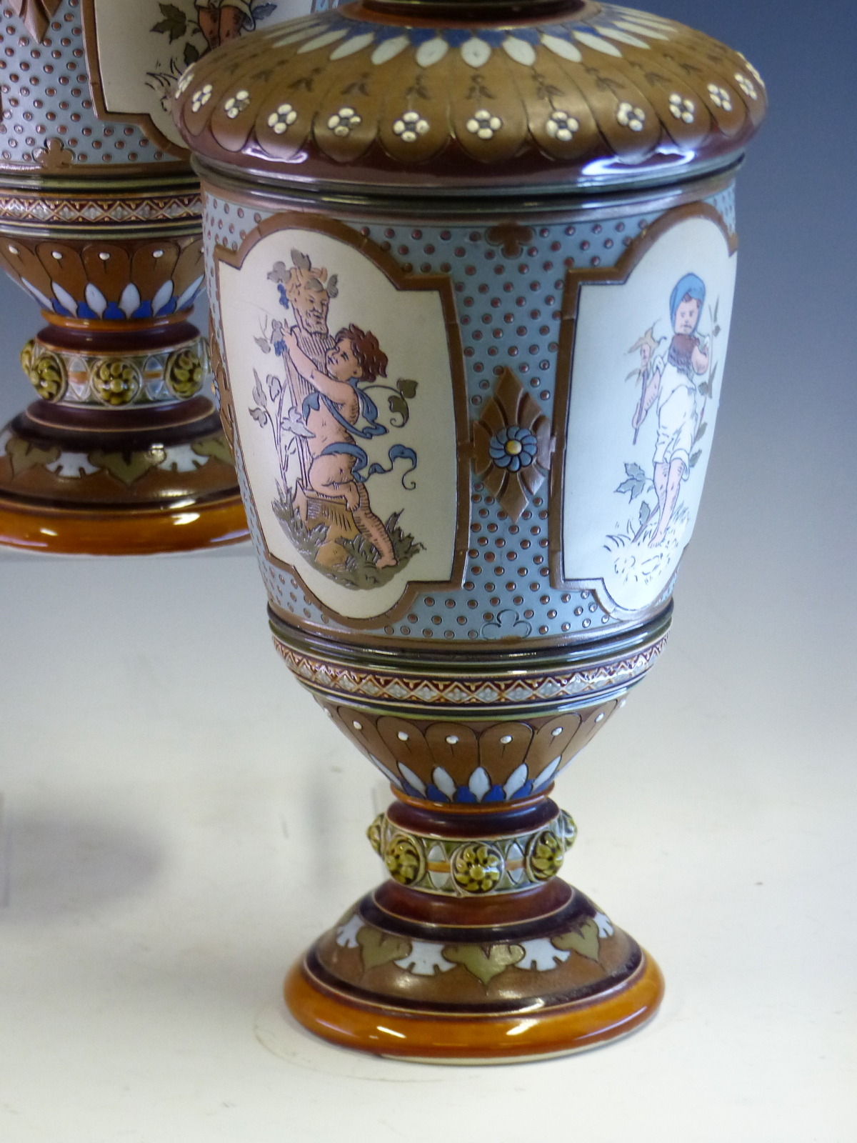 A PAIR OF METTLACH BALUSTER VASES INCISED WITH VIGNETTES OF PUTTI AMONGST FLOWERS ILLUSTRATING THE - Image 4 of 13
