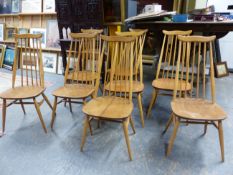 A SET OF EIGHT ERCOL HIGH BACK "GOLDSMITH" MODEL SPINDLE BACK DINING CHAIRS