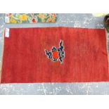 TWO TIBETAN MATS. LARGEST 140 x 72cms (2)