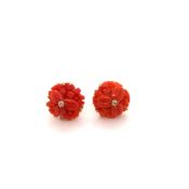 A PAIR OF CARVED CORAL AND DIAMOND EAR RINGS OF FLORAL DESIGN. UNHALLMARKED, ASSESSED AS 18ct
