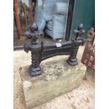 A LARGE VICTORIAN CAST IRON BOOT SCRAPE ON A PLINTH BASE