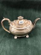 A GEORGE IV SILVER TEA POT BY EMES AND BARNARD, LONDON 1824, THE ROUNDED RECTANGULAR FORM WITH