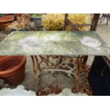 A CAST IRON AND MARBLE GARDEN TABLE W 103 H 73 D 48 cms
