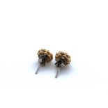 A PAIR OF DIAMOND CLUSTER STUD EARRINGS. THE STEMS STAMPED PLAT 950, ASSESSED AS PLATINUM. THE