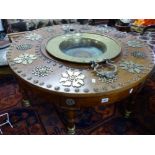 AN ANTIQUE SPANISH COLONIAL HARDWOOD AND BRASS BRAZIER TABLE.