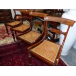 A SET OF FOUR EARLY 19th C. MARQUETRIED ROSEWOOD DINING CHAIRS, THE CURVED TOP RAILS AND CENTRAL