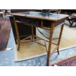 AN ANGLO JAPANESE TABLE, THE MAHOGANY TOP WITH BLACK LEATHER INSET, THE APRON AND DRAWER