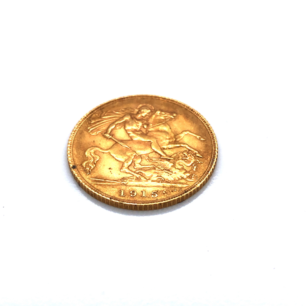 A 22ct GOLD HALF SOVEREIGN COIN, DATED 1915. - Bild 2 aus 3