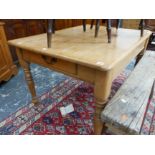 A VICTORIAN PINE KITCHEN TABLE WITH TWO DRAWERS ON TURNED LEGS. H 75 X L 120 X W 88cms.