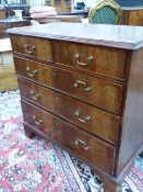 A GEORGIAN MAHOGANY CHEST OF TWO SHORT AND THREE GRADED LONG DRAWERS, EACH WITH BRASS HANDLES AND