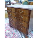 A GEORGIAN MAHOGANY CHEST OF TWO SHORT AND THREE GRADED LONG DRAWERS, EACH WITH BRASS HANDLES AND