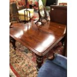 A 19th C. MAHOGANY DINING TABLE WITH FOUR LEAVES, THE RECTANGULAR ENDS ABOVE AN APRON, BALUSTER LEGS