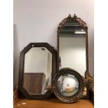 A REGENCY STYLE SMALL CONVEX MIRROR TOGETHER WITH TWO OTHER DECORATIVE MIRRORS (3)