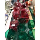 CRANBERRY GLASS JUGS AND BOWLS TOGETHER WITH SIX GLASSES WITH GREEN BOWLS