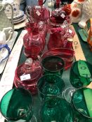 CRANBERRY GLASS JUGS AND BOWLS TOGETHER WITH SIX GLASSES WITH GREEN BOWLS