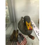 A PAINTED WOOD DECOY DUCK TOGETHER WITH TWO BRASS GUN OIL CONTAINERS