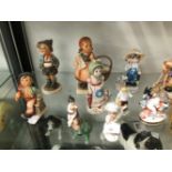 A COLLECTION OF HUMMELL AND OTHER FIGURES