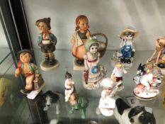 A COLLECTION OF HUMMELL AND OTHER FIGURES