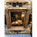 A PAIR OF STILL LIVES OF FRUIT, OIL ON PANEL AND IN GILT AND BLACK ELABORATE FRAMES. 55 x 47cms.