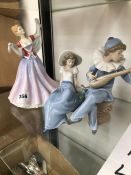 TWO NAO PORCELAIN FIGURES TOGETHER WITH A DOULTON LADY