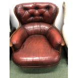 A RED LEATHER CHAIR