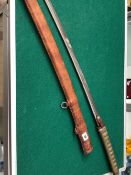 A VINTAGE JAPANESE KATANA SWORD IN LEATHER WRAPPED SCABBARD.