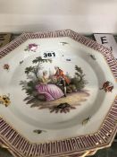 A SET OF FOUR BERLIN PLATES PAINTED WITH 18th C. COUPLES IN LANDSCAPES