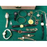 VARIOUS WATCHES AND COSTUME JEWELLERY, AND A SILVER BANGLE CONTAINED IN A VINTAGE JEWELLERY BOX.