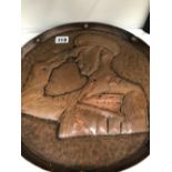 TWO COPPER CIRCULAR TRAYS WORKED WITH PORTRAITS OF GEORGE VI AND FIELD MARSHAL MONTGOMERY