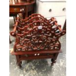 A 19th C. MAHOGANY CANTERBURY, THE THREE COMPARTMENTS WITH PIERCED SCROLL DIVISIONS ABOVE A DRAWER