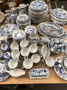 AN EXTENSIVE SERVICE OF HUTSCHENREUTER BLUE AND WHITE ONION PATTERNDINNER WARES